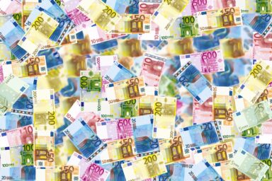 lot of euro banknotes, savings versus investment