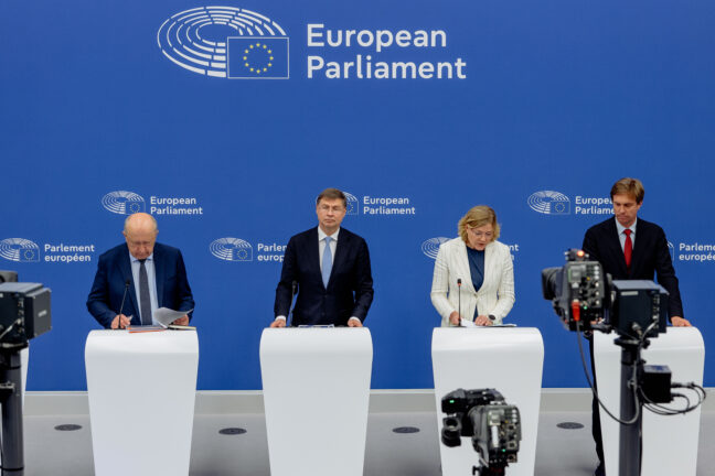 EU Commissioners (left to right) Andrius Kubilius, Valdis Dombrovskis, and Henna Virkkunen presenting the Omnibus Defence in Strasbourg.