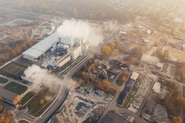 cloud of smie billowing from a factory