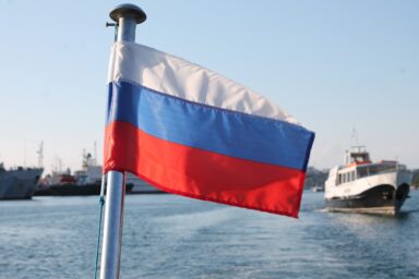 russian flag and ship at sea