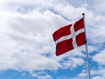 Danish flag aganist a sky backdrop