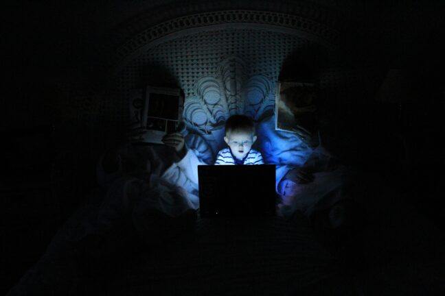Kid using a laptop. Source: Unsplash