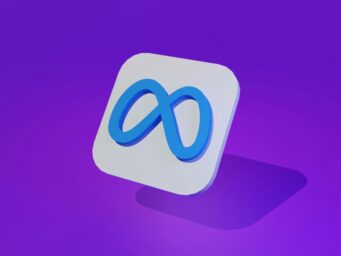 Meta logo in a purple background. Source: Unsplash