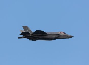 F35 US fighter jet against blue sky