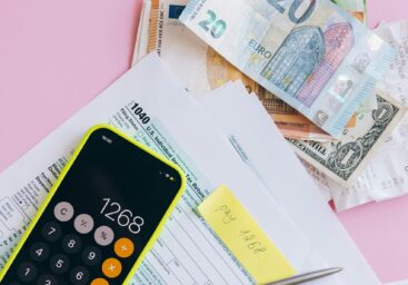 euro banknotes and calculator