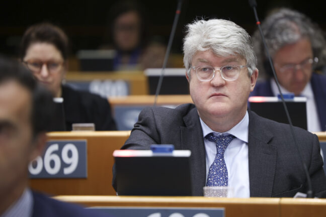 MEP Michael McNamara during voting session in the European Parliament