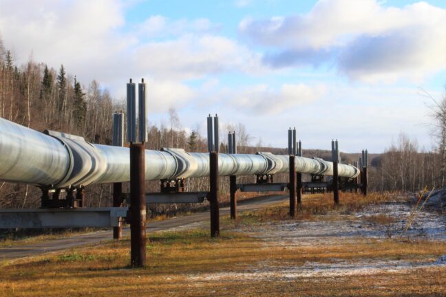 Oil pipeline running through a natural landscape