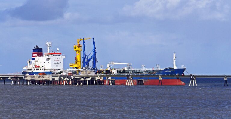 A tanker docked at an offshore oil terminal