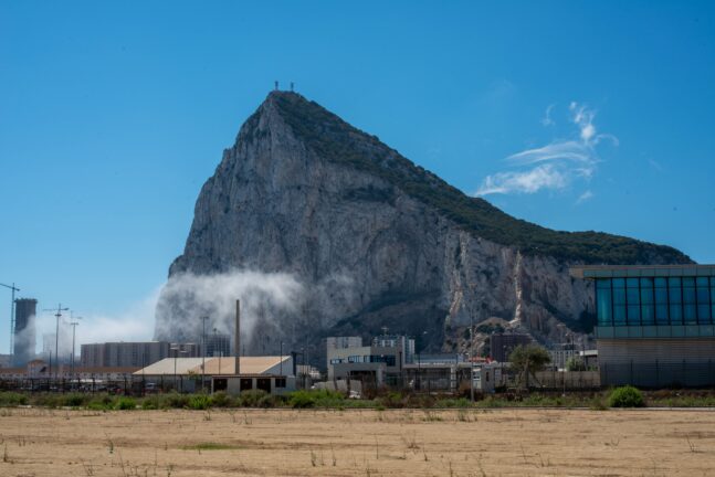 Rock of Gibraltar with border infrastructure in the foreground