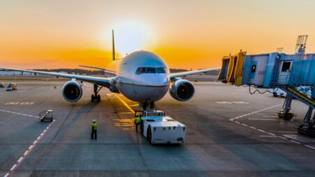 Aircraft on an airport tarmac preparing for departure