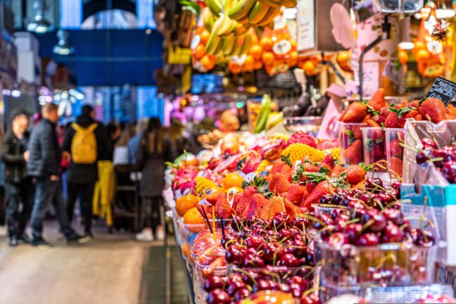 Colourful fruit and vegetable stall in a covered market