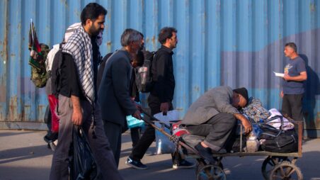 Group of migrants walking