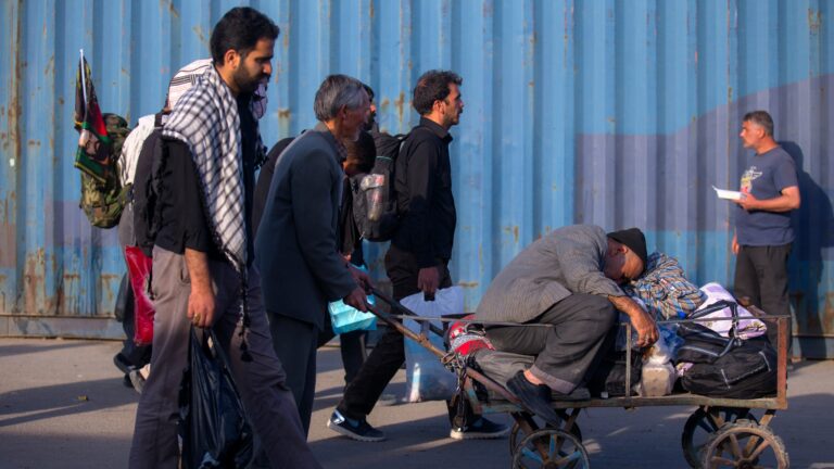 Group of migrants walking