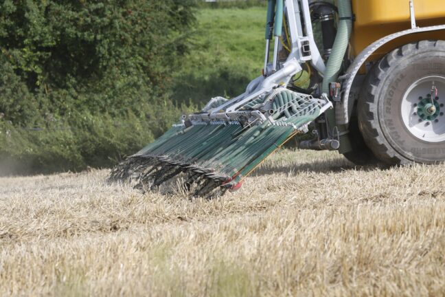 Close-up of a farming machine working in a field
