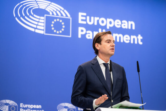 Malik Azmani speaking at a press conference at the European Parliament