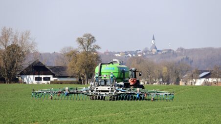 Agricultural machinery working in a field