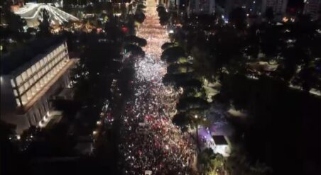 11:20Claude responded: Aerial view of mass protest in Tirana at nightAerial view of mass protest in Tirana at night
