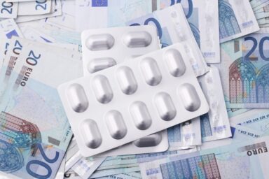 Blister packs of pills placed on euro banknotes