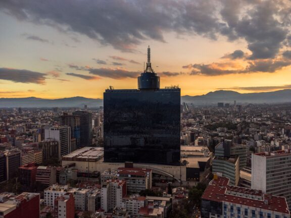 Aerial view of Mexico City skyline at sunset