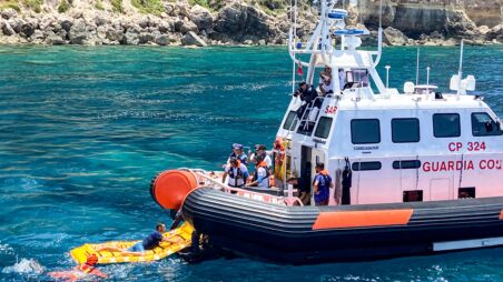 A vessel of Italian Coast Guard saving a refugee