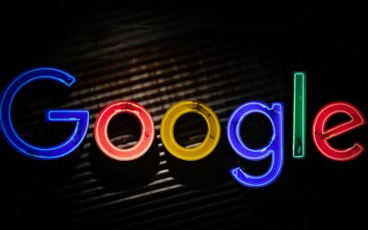 Google logo sign on an office wall
