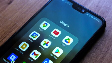 Smartphone screen showing a grid of Google app icons