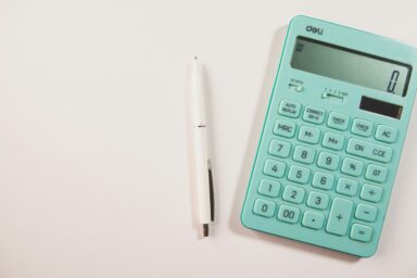 A calculator and a pen