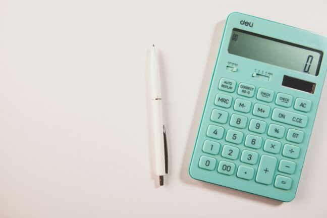 A calculator and a pen