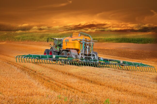 Agricultural machinery working on a field