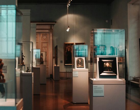 Historic paintings displayed inside a European museum