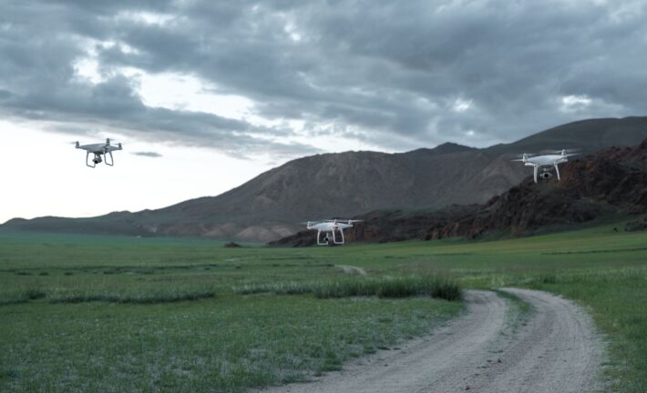 drones in open landscape