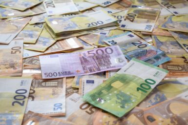 Various euro banknotes scattered together
