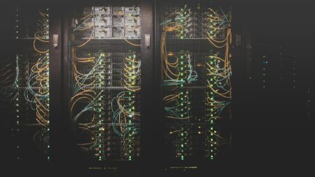 Fibre-optic cables connecting server racks in a data centre
