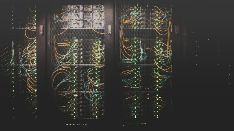 Fibre-optic cables connecting server racks in a data centre