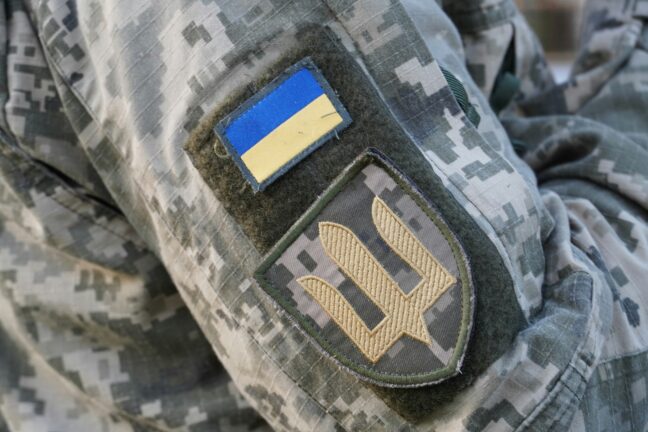 Ukraine flag on a soldier