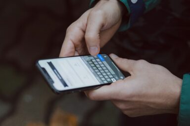 Hands holding a smartphone