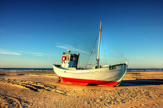 Fishing boat resting on the shore