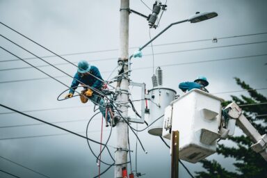 Workers on an electrical pole
