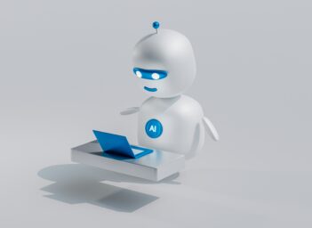 AI Robot behind laptop