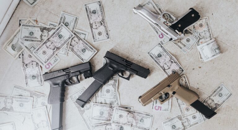 pistols and dollars