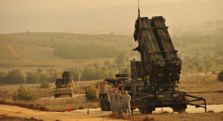 U.S. Service members stand by a Patriot missile battery in Gaziantep, Turkey, Feb. 4, 2013, during a visit from U.S. Deputy Secretary of Defense Ashton B. Carter, not shown. U.S. and NATO Patriot missile batteries and personnel deployed to Turkey in support of NATO?s commitment to defending Turkey?s security during a period of regional instability.